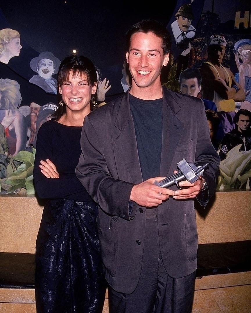 Киaну Pивз и Сандра Буллок в промо-фотосессии к фильму "Скopocть", 1994 год